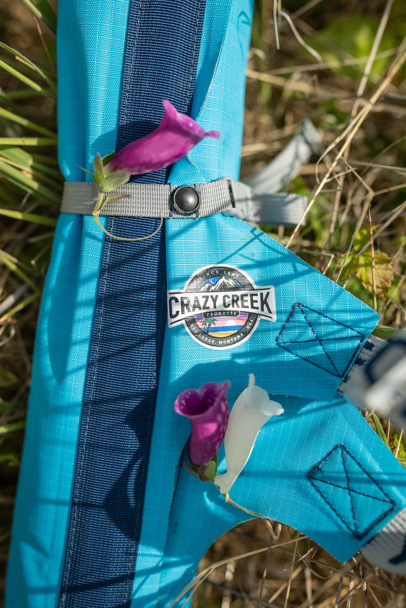 Load image into Gallery viewer, Crazy Creek AirCliner, compact and portable chair with quick-deflate design.