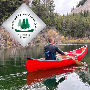 Northern Forest Canoe Trail logo with a man paddling a red canoe while sitting in a Crazy Creek paddle chair