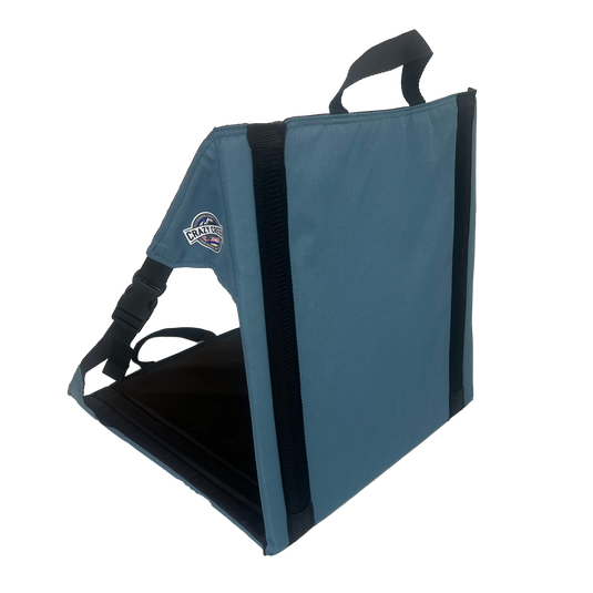 Casual chair in blue - by crazy creek sitting on white background