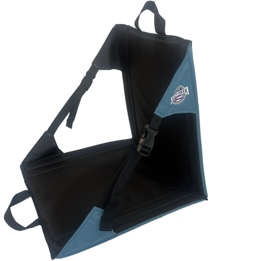 Casual chair in blue - by crazy creek sitting on white background side profile