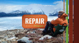 Crazy Repair program - Man sitting in his chair on the edge of a icy and mountainous lake