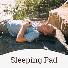 Crazy Creek chair being used as a sleeping pad